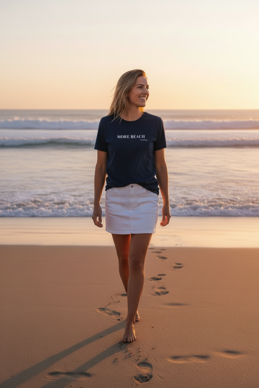 More Beach tee model in white denim skirt on beach